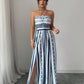 👗 49% OFF NOW! 💥 Geometric Jumpsuit with Halter Neckline & Side Slit – Unique print & elastic back – Versatile, perfect for summer parties or resort wear ✨