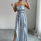 👗 49% OFF NOW! 💥 Geometric Jumpsuit with Halter Neckline & Side Slit – Unique print & elastic back – Versatile, perfect for summer parties or resort wear ✨